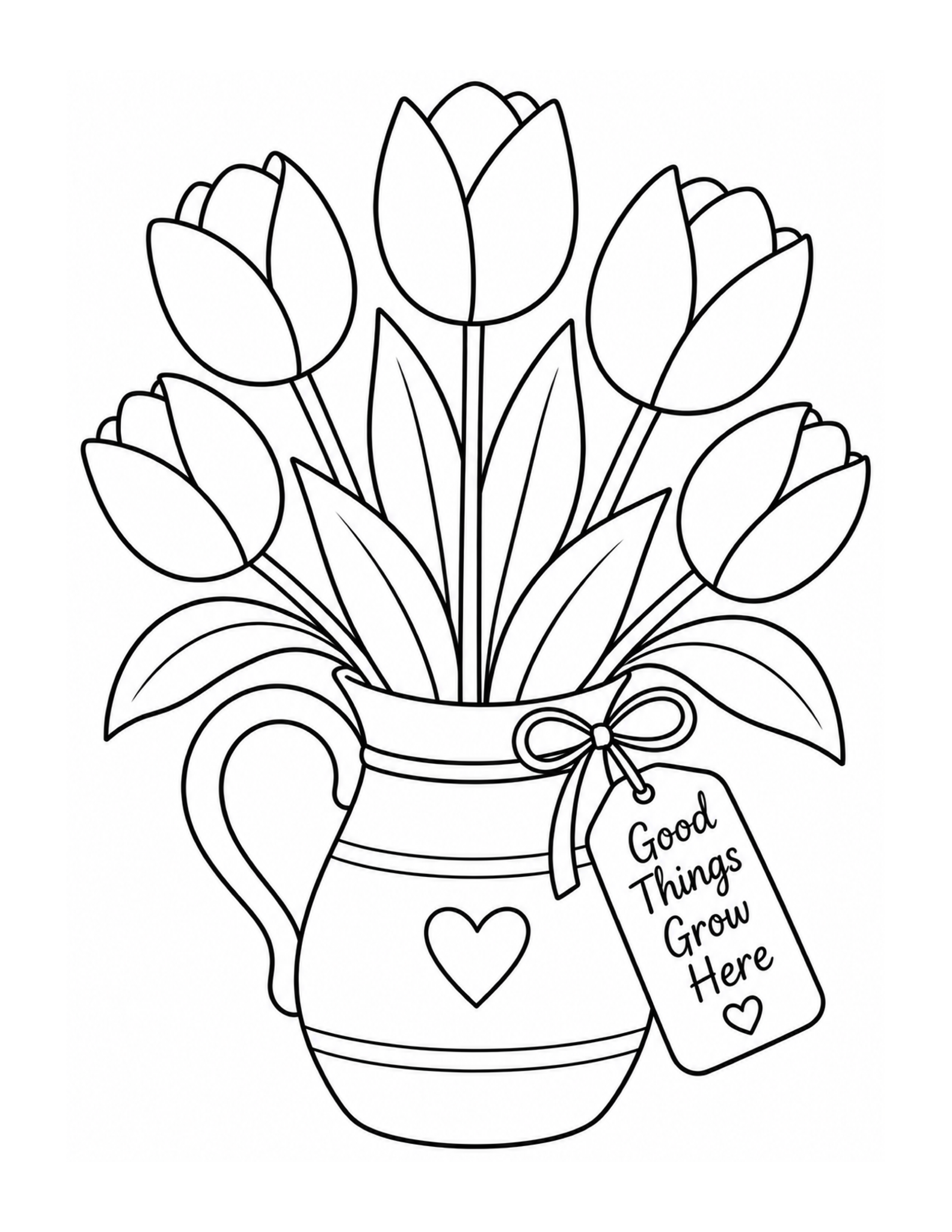 A ribbon-tied vase holds tulips with a small Good Things Grow Here tag.